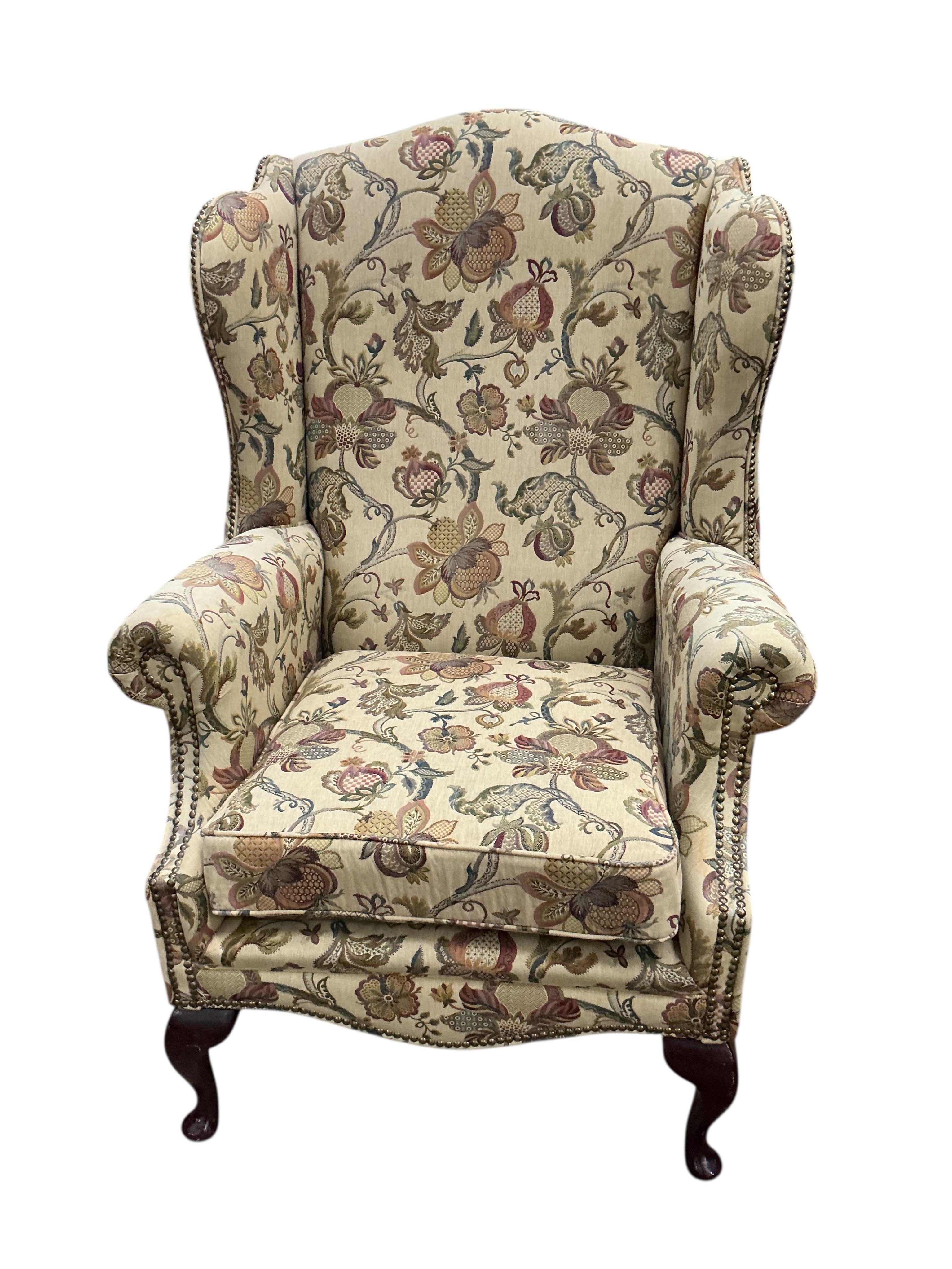 A pair of George III style upholstered wing armchairs, width 80cm, depth 74cm, height 120cm